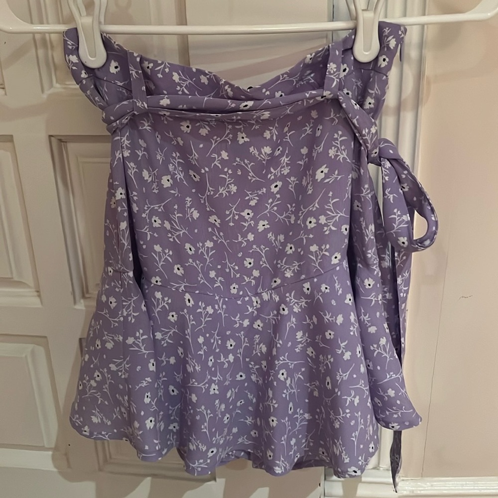 New with tags, Zara floral mini skirt with shorts underneath. Size XS